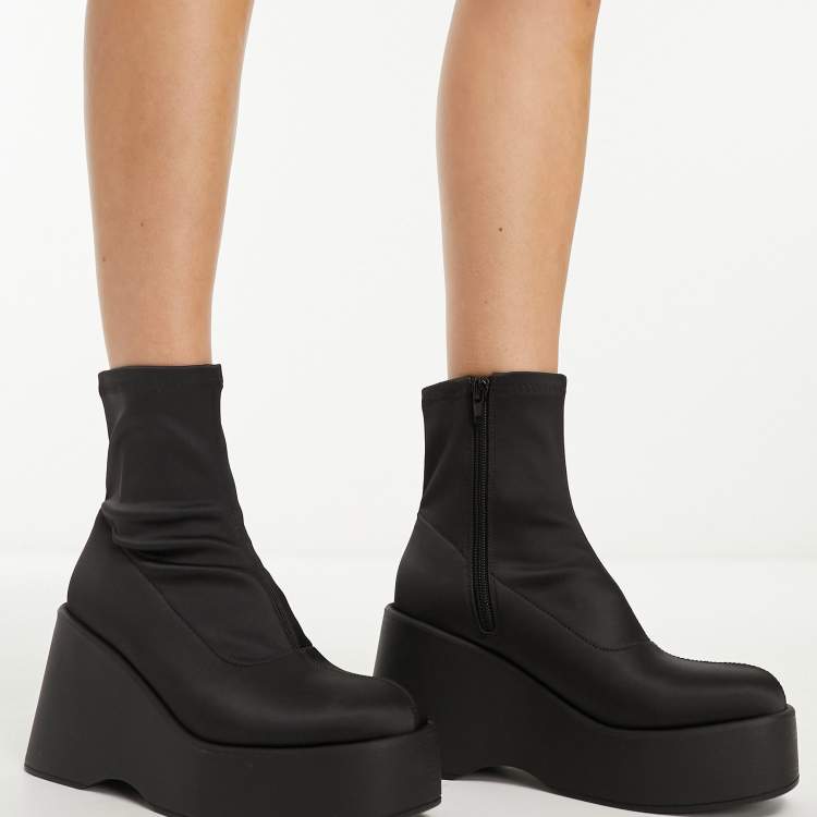 ALDO Silo black satin wedge ankle boot retailer catalog reference. Actual pre-owned size 11 pair shown in the second photo.